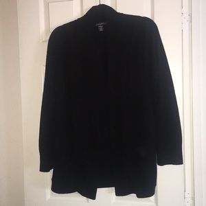 Black cardigan with pockets.